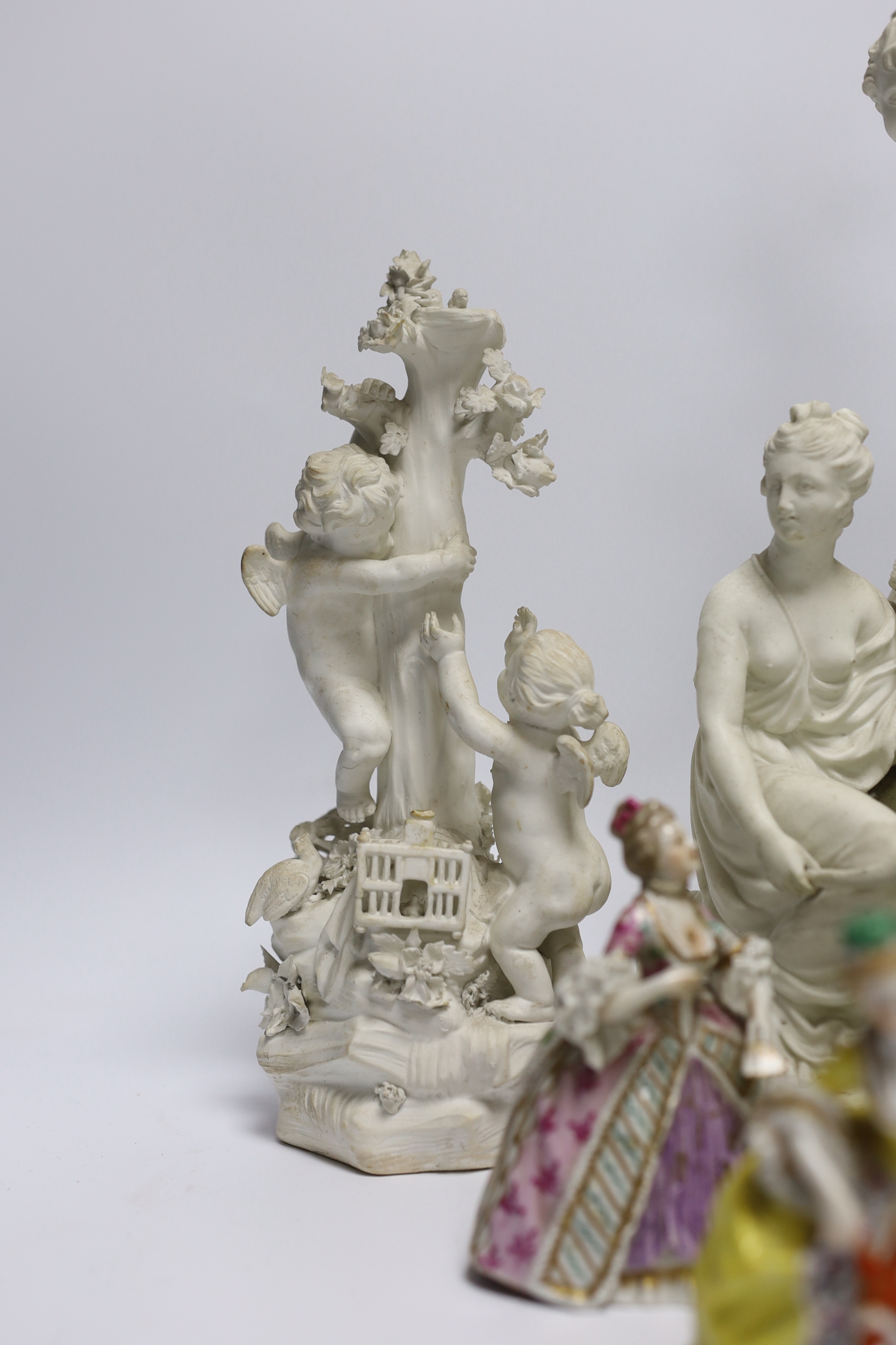 Two late 18th century biscuit figural centrepieces, six figurines and another, tallest 40cm